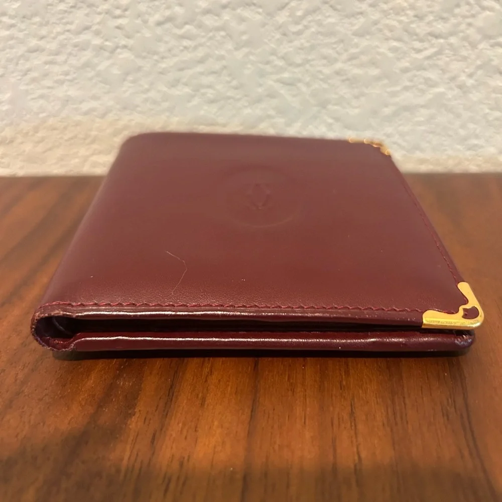 Cartier Burgundy Leather Wallet with Gold Corner Accents
